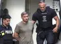 Bărbat escortat de polițiști români dintr-o dubă